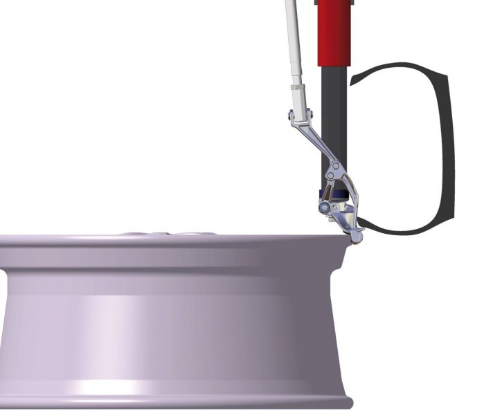 Rav Slivo Tool Lifting the Lower Tire Bead